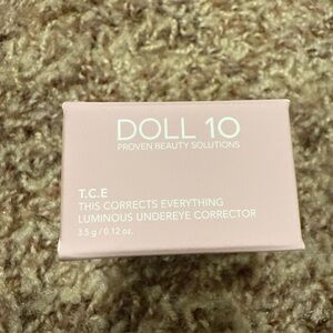 Dollcake T.C.E Luminous Undereye Corrector in Soft Pink